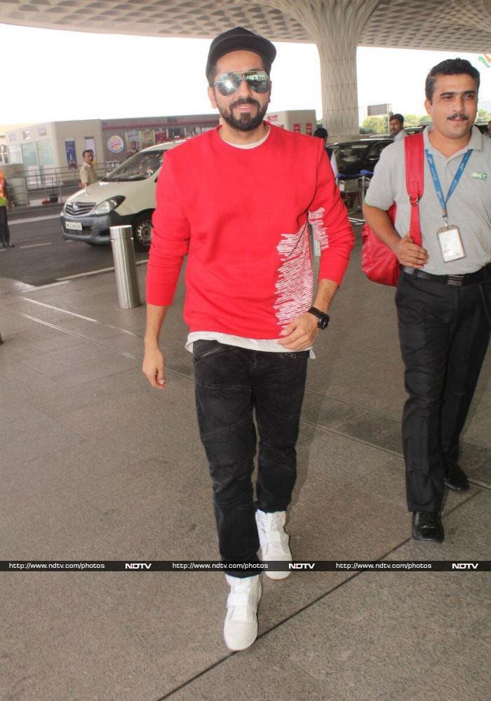 Ayushmann Khurrana opted for a red t-shirt and black trouser.