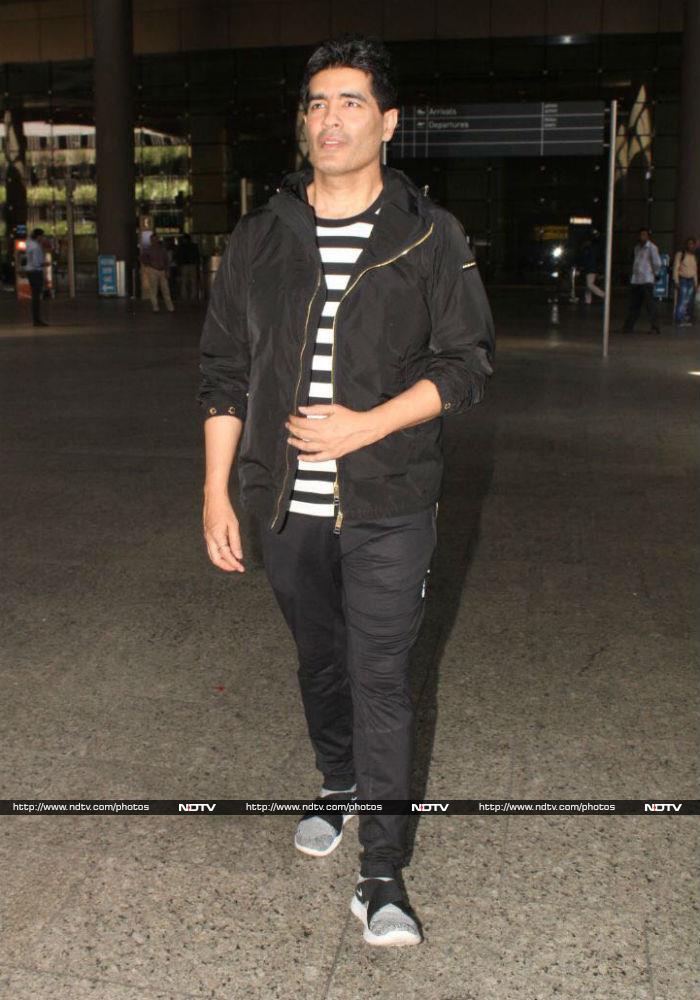 Manish Malhotra was also photographed at the airport.