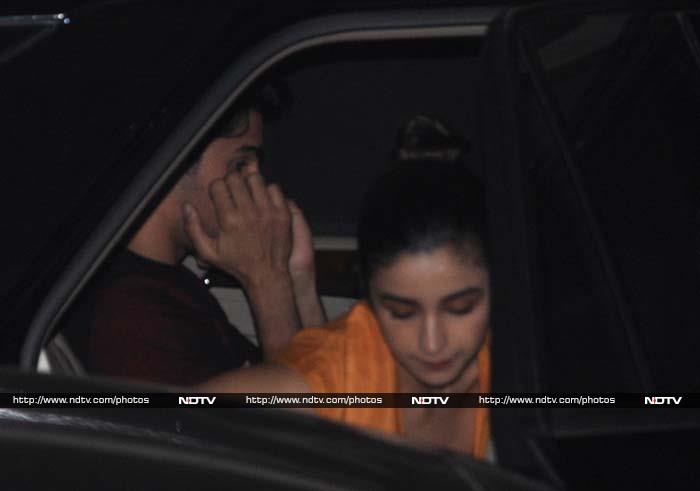 Actress Alia Bhatt, who is rumoured to be dating actor Sidharth Malhotra, joined the actor for his birthday celebrations on January 16. Sidharth was with his fans in Mumbai. Sidharth hosted a party at his mentor Karan Johar's residence on Sunday night and it is still not clear if Alia was present or not at the party. But the paparazzi photographed someone hiding in the back seat of the car.