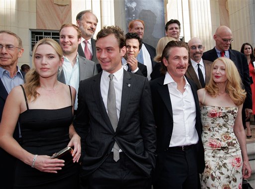 From left front, Kate Winslet, Jude Law, Sean Penn and Patricia Clarkson pose for a photo at a screening of All The King's Men at McAlister Auditorium at Tulane University in New Orleans.