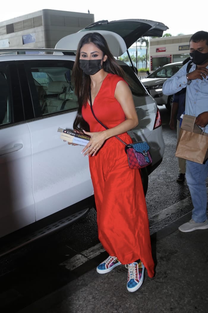 Mouni Roy looked pretty in all-red attire as she was pictured at the airport.