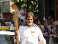 Photo : ओलिंपिक मशाल लेकर दौड़े अमिताभ...