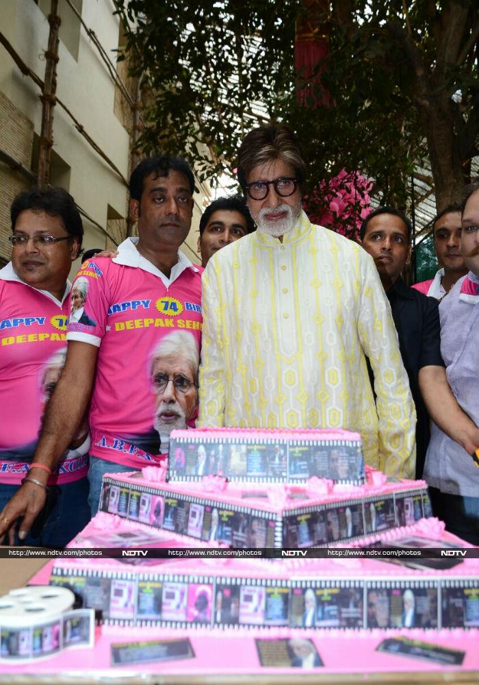 Mr Bachchan posed with his cake, which comprise show-reel icing.