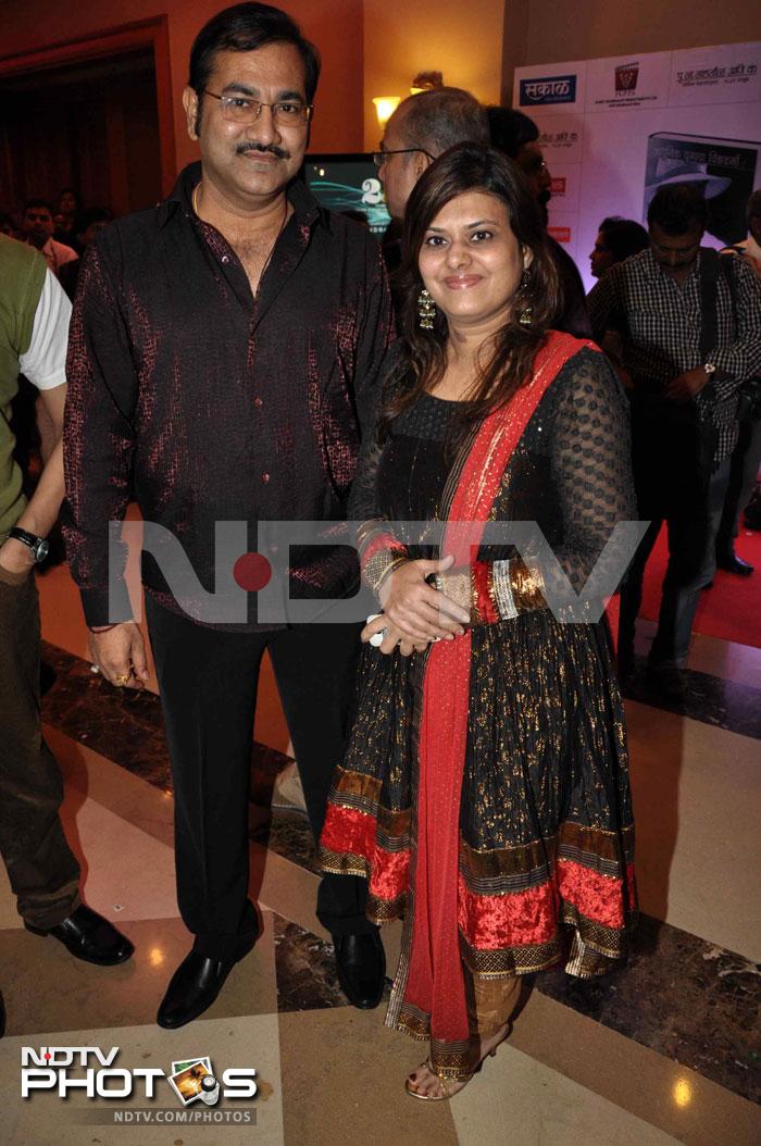 Singer Sudesh Bhonsle was only too pleased to pose for the cameras in the company of his wife.