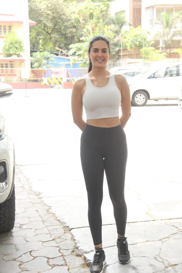 Esha Gupta posed for shutterbugs outside the gym.