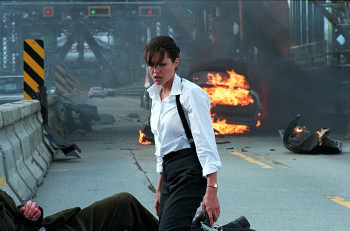 In <i>Taking Lives</i> (2004) Jolie portrayed FBI profiler Illeana Scott who suddenly finds herself on a twisted and terrifying journey, surrounded by suspects in a case that has become chillingly personal. While the film received mostly unfavourable reviews, critics were willing to be more charitable to Jolie's performance. "Jolie is far too good for this tripe but she does give the film its only believable moments, and for the first half, her concentration makes you watch her intently," wrote Salon.com.