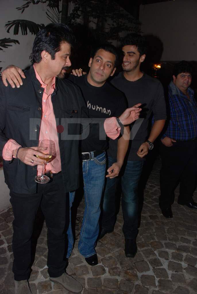 Standing In Line: Anil and Salman are good boys.