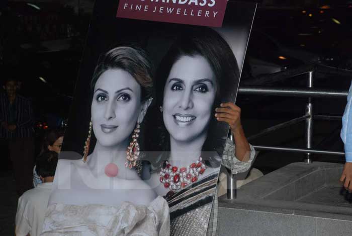 A poster of Neetu Singh and daughter Riddhima Kapoor for the latter's jewellery collection.