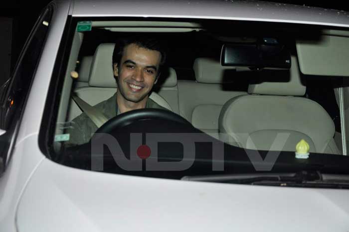 Punit Malhotra looks straight into the camera.