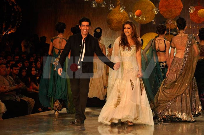 Ash and Manish share a light moment on the ramp.