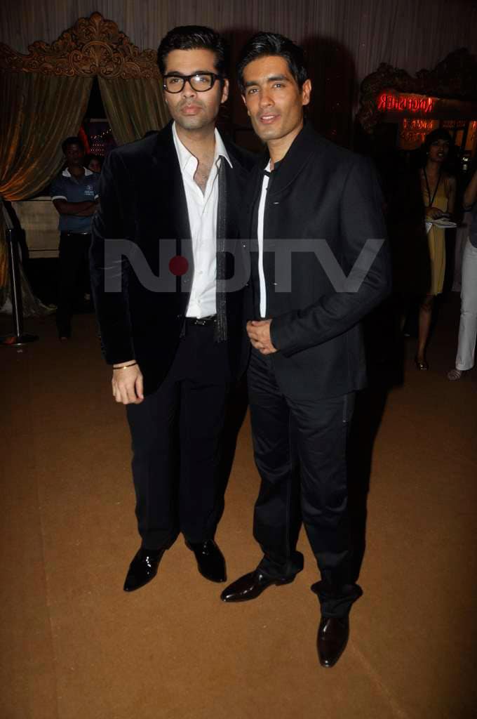 Manish Malhotra poses with Karan Johar before the show.