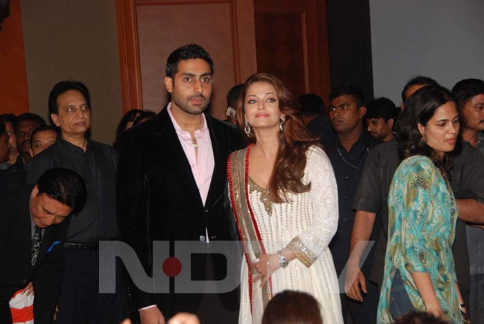 Aishwarya Rai Bachchan and Abhishek Bachchan pose for the camera.