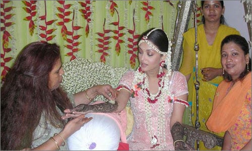 <b>The bride-to-be</b>: Ash looking at her mehendi pattern