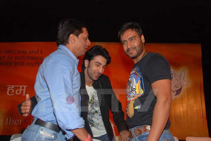 Ranbir Kapoor greets filmmaker Madhur Bhandarkar and actor Ajay Devgn at the gathering.