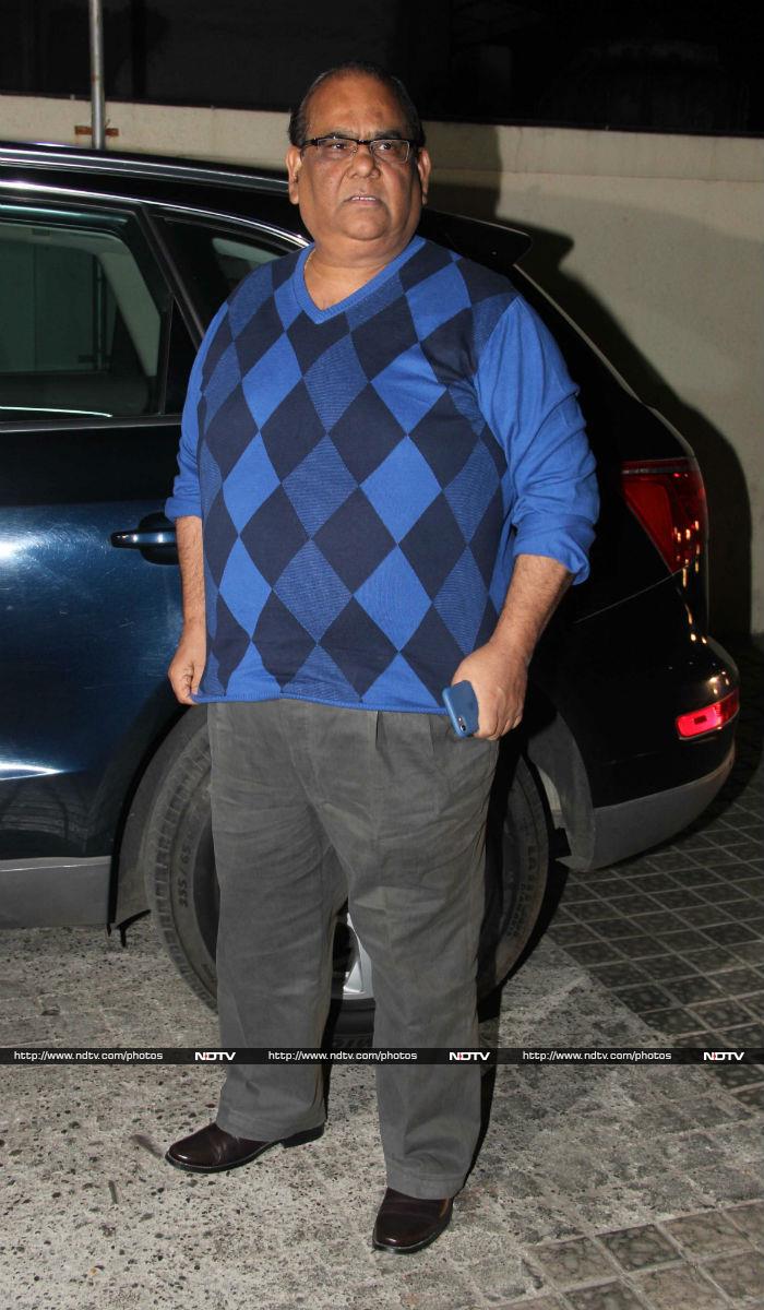 Actor filmmaker Satish Kaushik was dressed in blue.