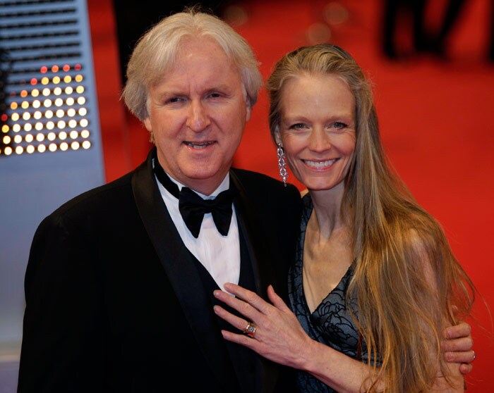 Canadian director James Cameron, left, accompanied by his wife Suzy Amis arrive, at the British Academy Film Awards 2010, at The Royal Opera House in London, on Sunday, February 21, 2010. (Photo: AP)