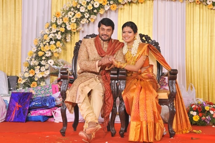 Bala and Amrita Suresh pose for the cameras.