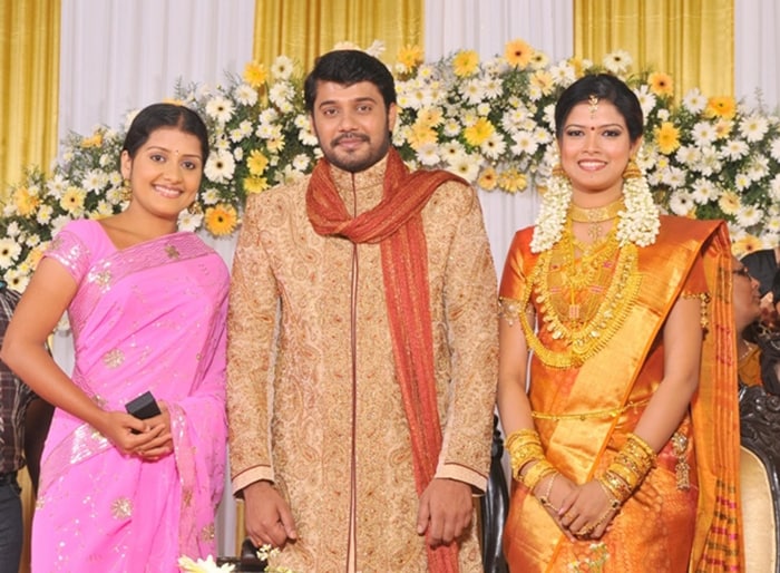 Actress Sarayu with the couple.