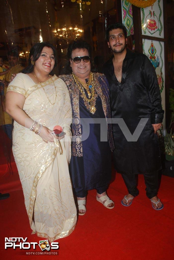 Music director and singer Bappi Lahiri stepped out with his family to celebrate Durga Puja. Seen here with his daughter Rema and son Bappa.