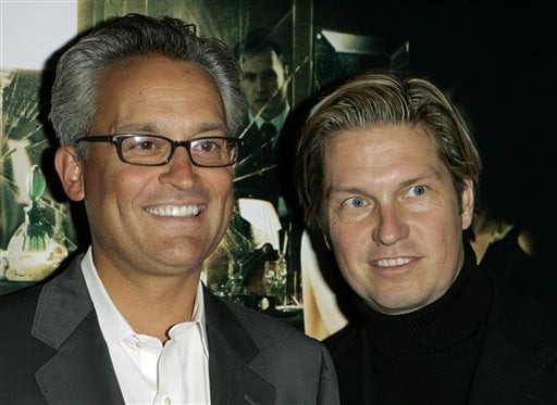 Designers Marc Badgley, left, and James Mischka, right, pose for photographers during arrivals at the world premiere of the thriller film Basic Instinct 2. (AP)