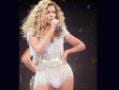 Photo : Curvy Beyonce shows off figure at concert