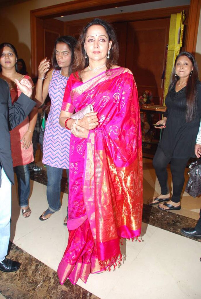 Hema Malini is resplendent in pink silk.