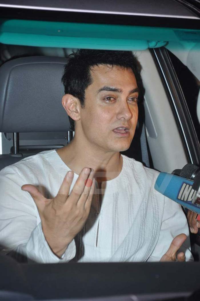 Aamir Khan drives up for the party.