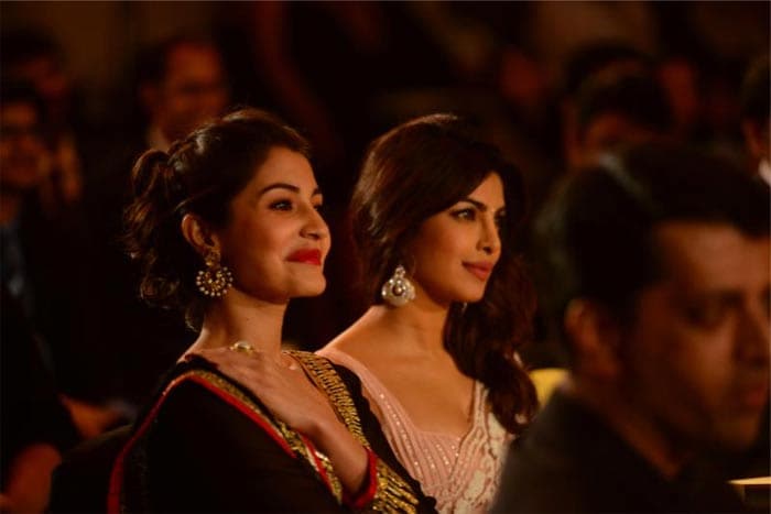 Mr Bachchan also posted a picture of Priyanka and Anushka and wrote, "the two lovely ladies that graced the occasion .. so honoured that they took time off from their busy schedule and came across for me.." <a href="https://www.facebook.com/photo.php?fbid=534417103258750&set=a.452056338161494.108384.449082841792177&type=1&theater" class="fn fl fa fs12">(This image was posted on Facebook by Amitabh Bachchan)</a>