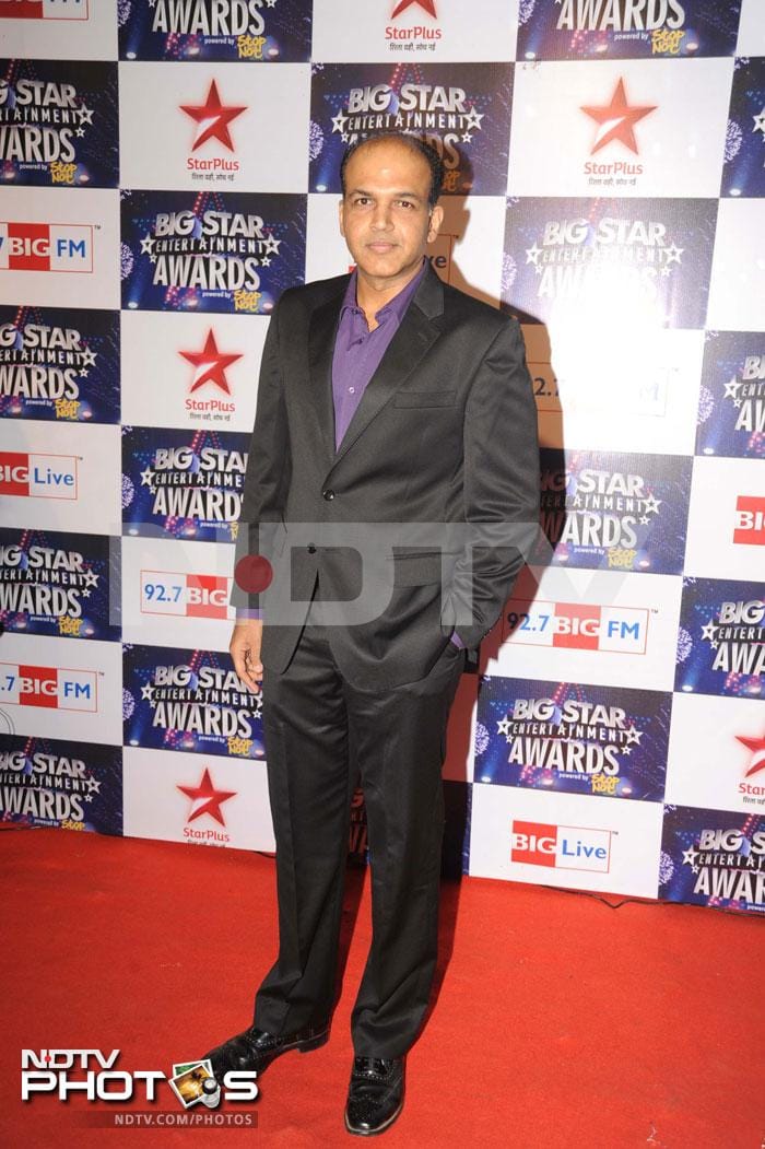 Ashutosh Gowariker in black formals.