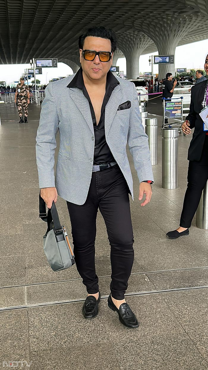 Govinda was pictured at the airport as well.  (Image Courtesy: Varinder Chawla)