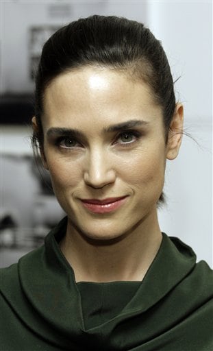 Jennifer Connelly poses for photographers as she arrives at the Museum of Modern Art in New York for a special screening of her new film Blood Diamond.