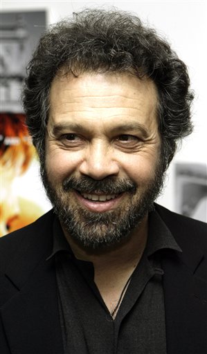 Film director Edward Zwick poses for photographers as he arrives at the Museum of Modern Art in New York for a special screening of his new film Blood Diamond.