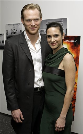 Jennifer Connelly pose for photographers with her husband, actor Paul Bettany as she arrives at the Museum of Modern Art in New York for a special screening of her new film Blood Diamond.