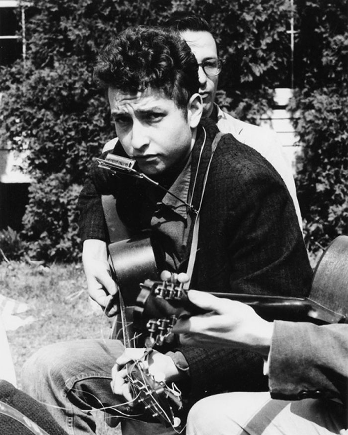 Dylan, whose real name is Robert Zimmerman, started his singing career in the early 1960s when he moved to New York to meet his hero, folk musician Woody Guthrie who was hospitalized.  Dylan hoped to be Guthrie's greatest disciple.  <br><br>
Dylan started singing in clubs around Greenwich Village from 1961.