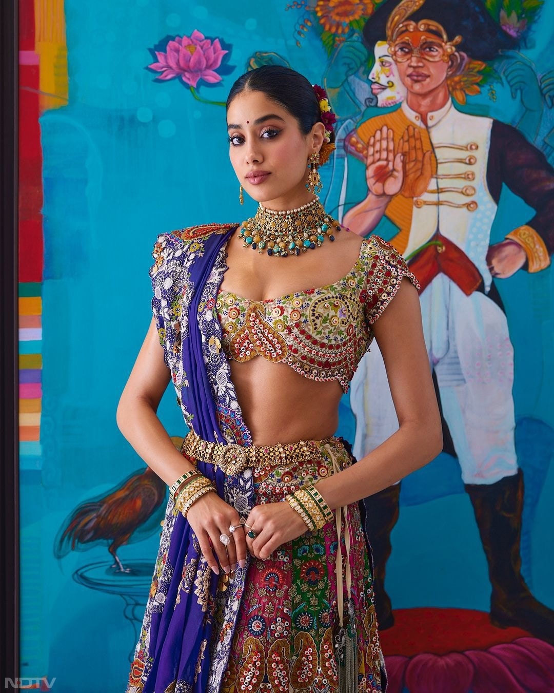 Janhvi Kapoor looked breathtaking in a Gujarati-inspired lehenga choli, paired with an intricately designed blouse and accented with a traditional waist belt that beautifully enhanced the authenticity of her graceful look. (Instagram/@janhvikapoor)