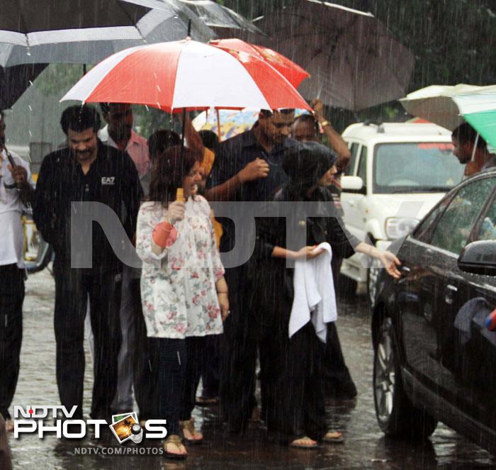 A walk in the rain: Anil and Sunita Kapoor