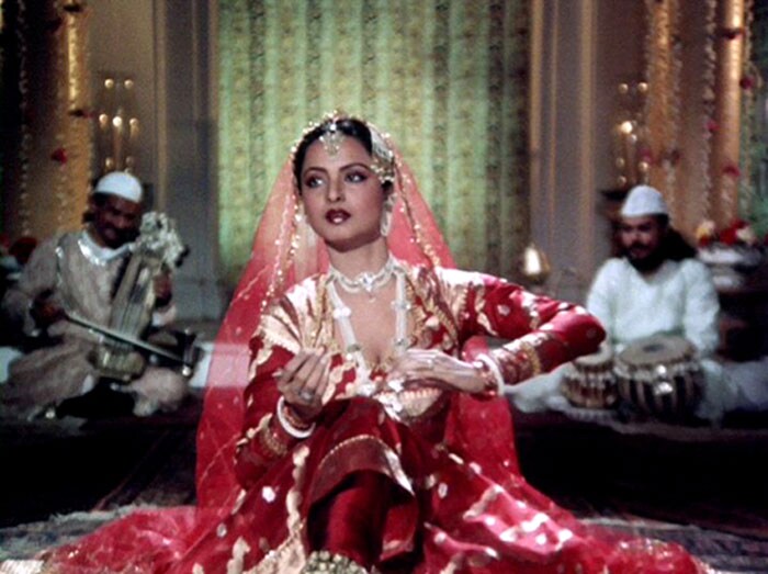 Vision of Love: Rekha as <i>Umrao Jaan</i> was poetry in the courtesan's silk and bejeweled costumes.