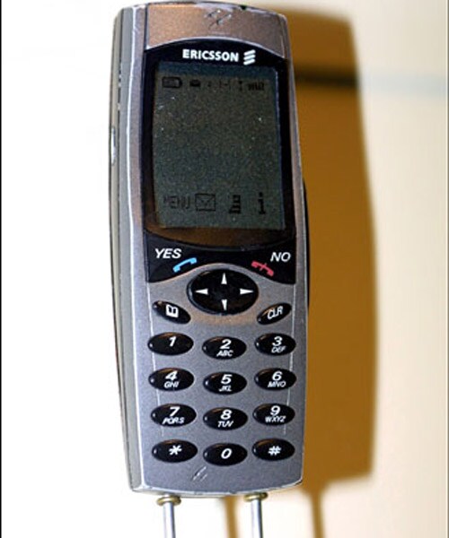 <B>The first</b>: Pierce Brosnan may have been among the first people in the world to use (or pretend to use) a mobile phone, as it was introduced in the film <I>Tomorrow Never Dies</i> (1997). Ericsson's concept phone had a few features specially for Bond, like a finger print detector and a stun gun.