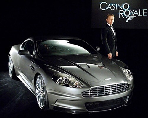 <B>Technologically challanged</b>: Aston Martin continues to be a favourite accompaniment to the Bond figure; even Daniel Craig, who is known to be the least gadget friendly Bond, looked like a natural next to the sexy car in <I>Casino Royale</i> (2006).