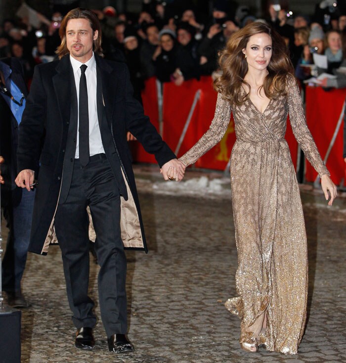 Much in love Jolie, Pitt promote new film together