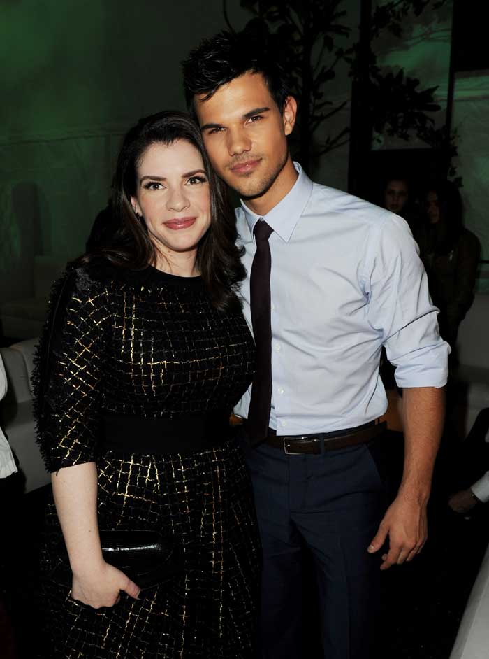 Author Stephenie Meyer and actor Taylor Lautner, who plays Jacob Black in the series, pose at the after party for the premiere of <i>The Twilight Saga: Breaking Dawn - Part 1</i>.