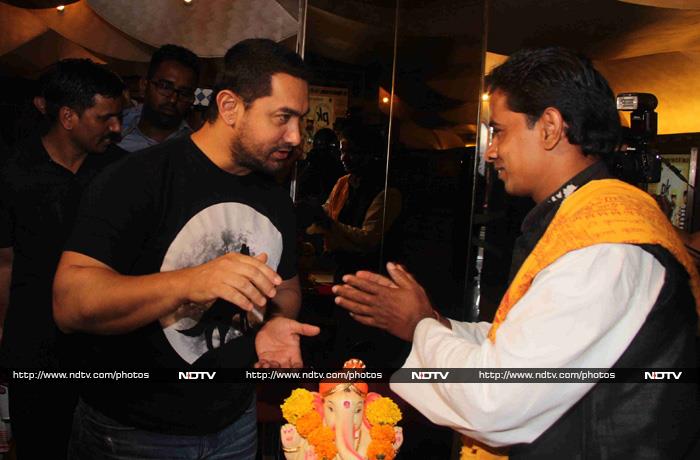 Aamir also sought the blessings of a priest.<br><br>
Coming up - <i>Broken Horses</i> and a Vintage Car: Big B, Aamir, Sushant