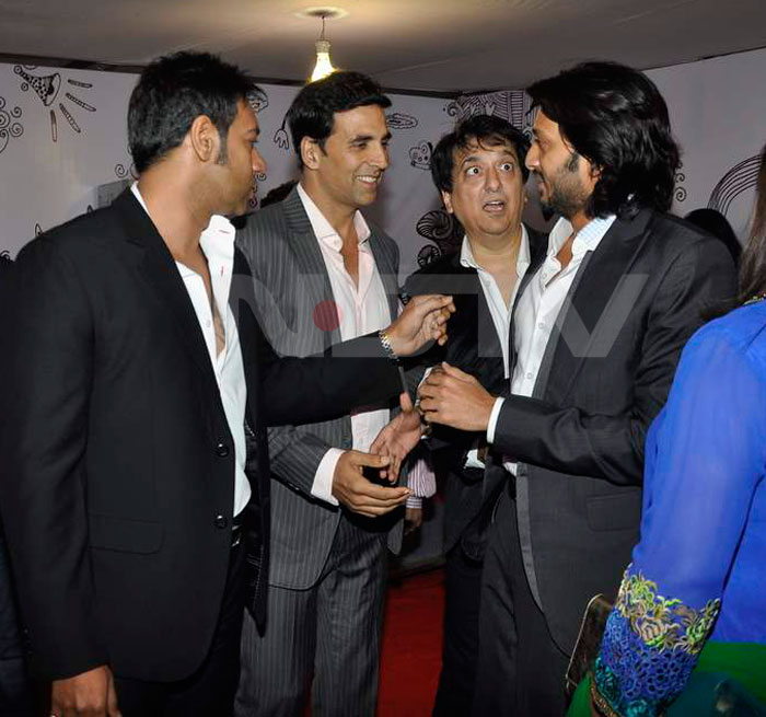 Sajid Nadiadwala gives Riteish Deshmukh googly eyes, while Ajay Devgn and Akshay Kumar enjoy the show.