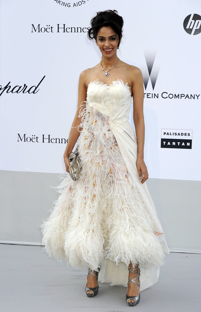 Cannes 2011: Mallika impresses in White