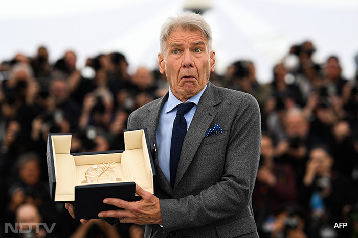 Veteran actor Harrison Ford posed with his Honorary Palme d'Or during a photocall for his film <i>Indiana Jones and the Dial of Destiny</i>. (Image courtesy: AFP)