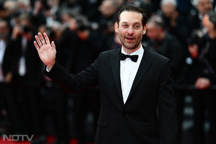 <i>Spider-Man</i> star Tobey Maguire made a stellar appearance on the red carpet in a black suit. (Image Courtesy: AFP)