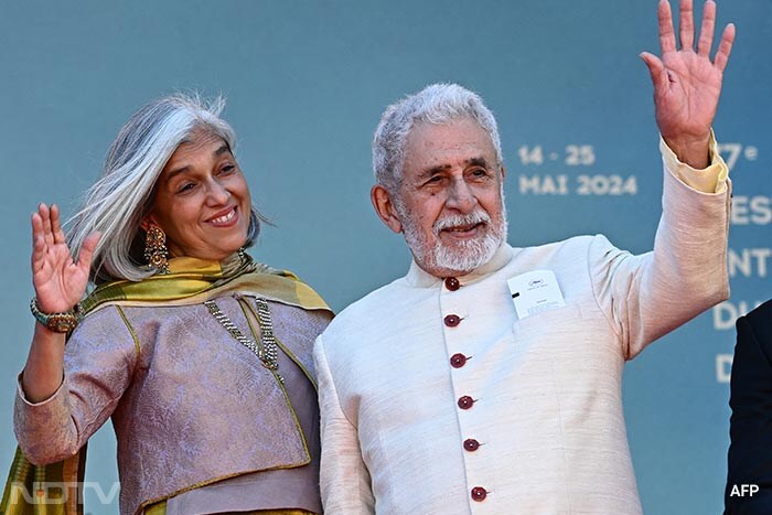 Naseeruddin Shah and Ratna Pathak Shah were all smiles at the screening of <i>Manthan</i>. (Image courtesy: AFP)