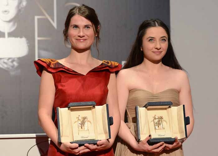 Romanian actresses Cosmina Stratan and Cristina Flutur shared the Best Actress prize for their roles in Cristian Mungiu's <i>Beyond the Hills</i>, a story about a young nun and her friend who falls victim to exorcism.