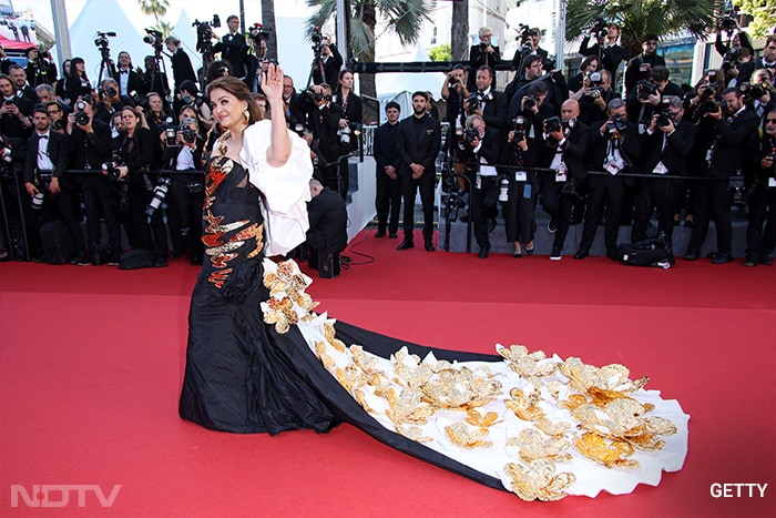 Like every year, this year also Aishwarya Rai Bachchan slayed her Cannes look in a black and white gown with a dash of bling.(Image Courtesy: Getty)