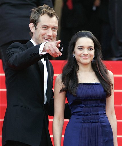 British actor Jude Law, left, and American actress-singer Norah Jones arrive for the screening of the film My Blueberry Nights, at the 60th International film festival in Cannes.